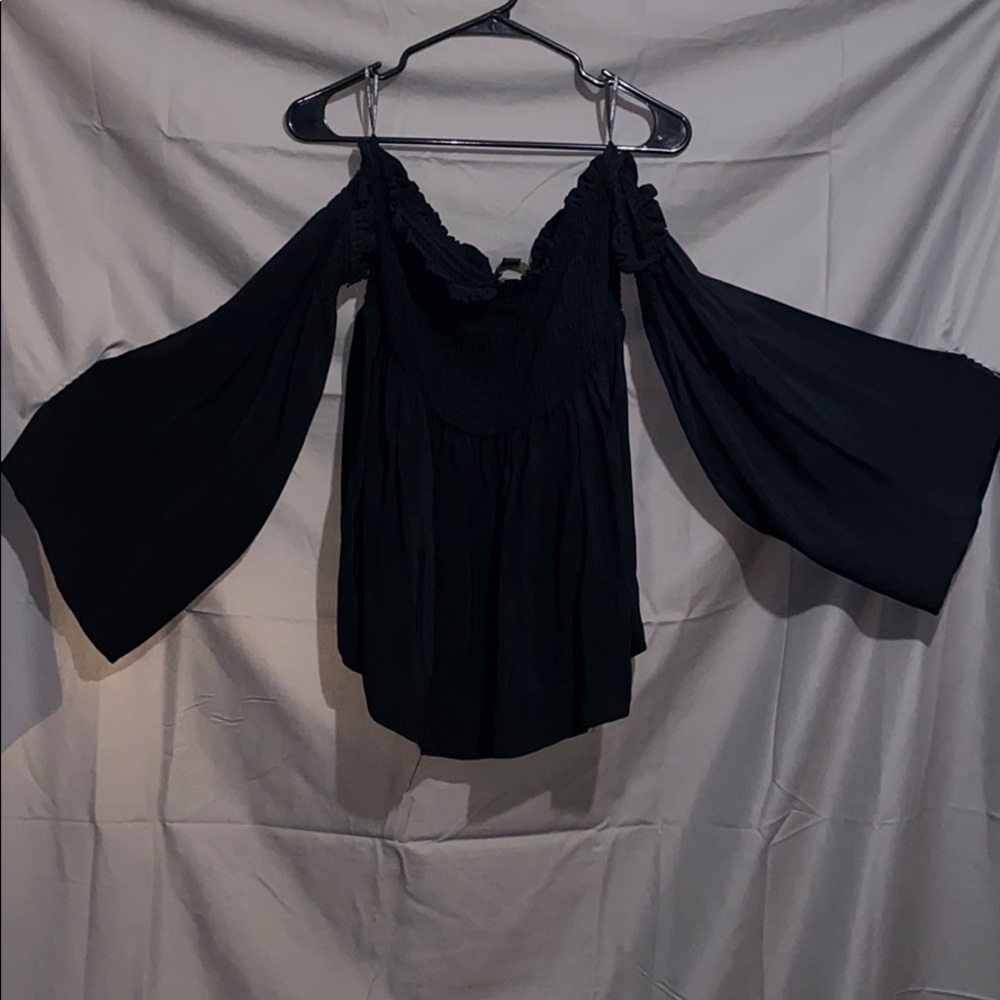 Off the shoulder baby doll shirt.